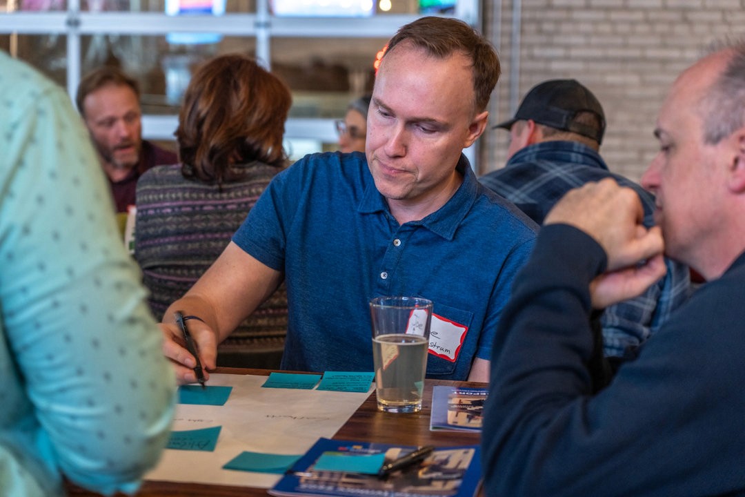 Participants talking through an idea